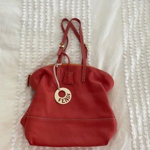 Orange leather shoulder bag.